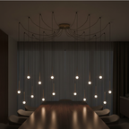 Lustre pluie de seize points LED finition laiton Solenne