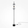 Lampadaire fin en métal noir à deux globes Lorgnette