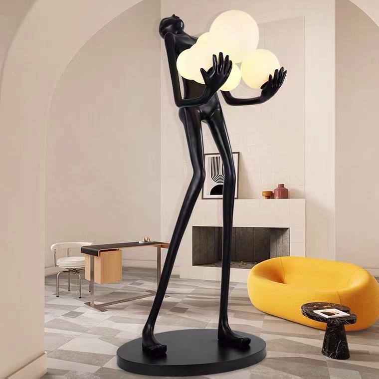 Lampadaire sculpture en résine silhouette humaine globes levés Gerbe