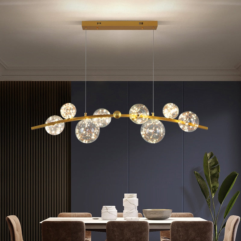Lustre sphères transparentes étoilées sur barre en métal Zodiaque, finition dorée – vue 4