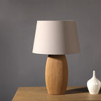 Lampe à poser en céramique fait main pied ovoïde Graine