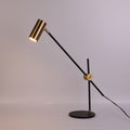 Lampe à poser orientable noire et dorée à balancier Équilibre