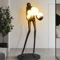 Lampadaire sculpture en résine silhouette humaine aux sphères Jongleur