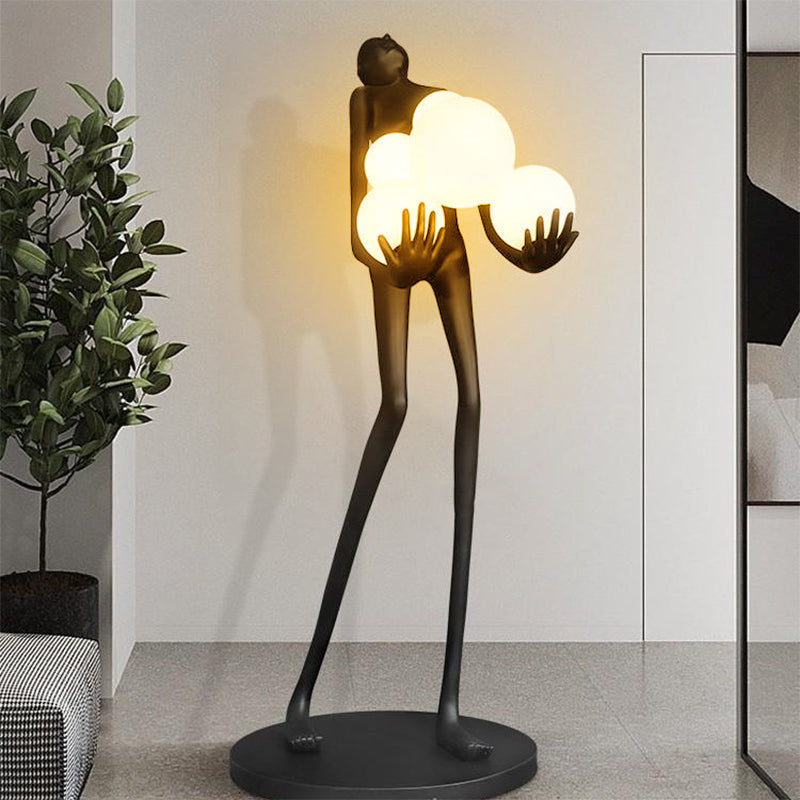 Lampadaire sculpture en résine silhouette humaine aux sphères Jongleur