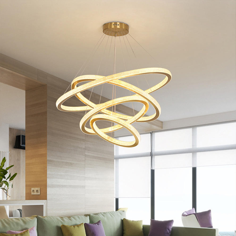 Suspension trois anneaux lumineux dorés Gyroscope