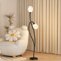 Lampadaire tige noire à fleurs blanches Floraison