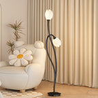 Lampadaire tige noire à fleurs blanches Floraison