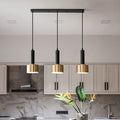 Lustre trois lampes noir et or sur plateau Tercet, finition noir et or