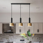 Lustre trois lampes noir et or sur plateau Tercet, finition noir et or