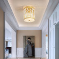 Plafonnier cylindre doré à plaques en cristal Tourelle, finition dorée