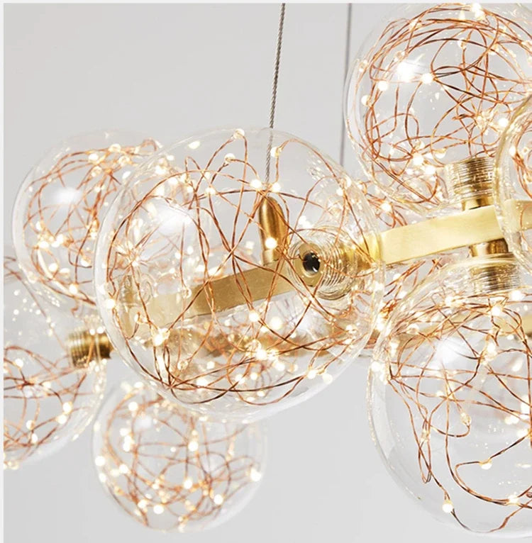 Lustre couronne dorée en fer et verre transparent Nébuleuse – vue 13