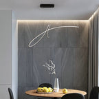 Suspension LED noire en forme de A cursif Monogramme