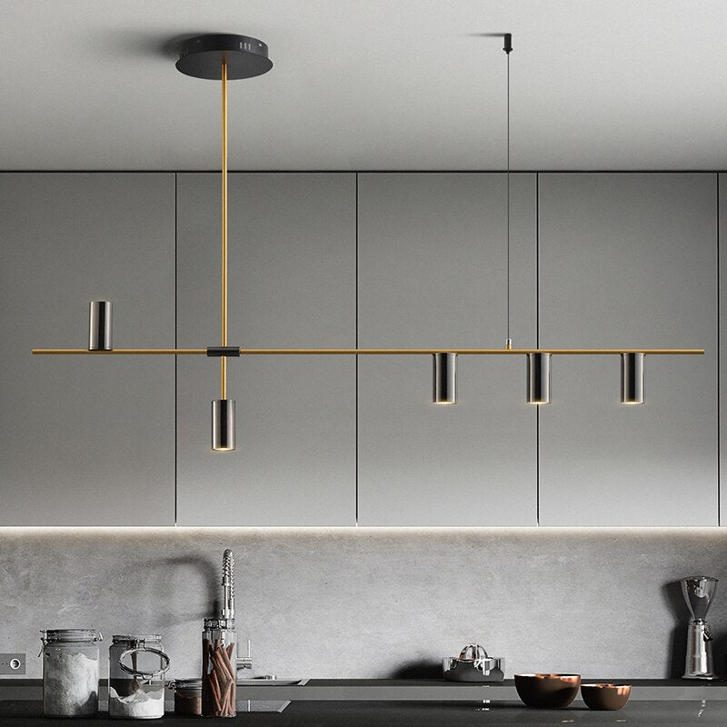 Lustre barre noire à cylindres dorés Pirouette, finition noire
