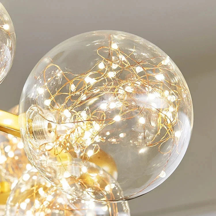 Lustre couronne dorée en fer et verre transparent Nébuleuse – vue 14