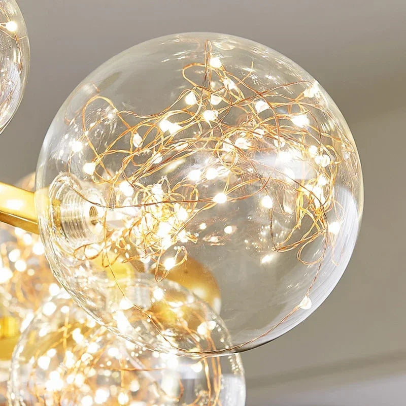 Lustre couronne dorée en fer et verre transparent Nébuleuse – vue 5