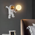Applique murale astronaute et lune Odyssée, finition blanc et or