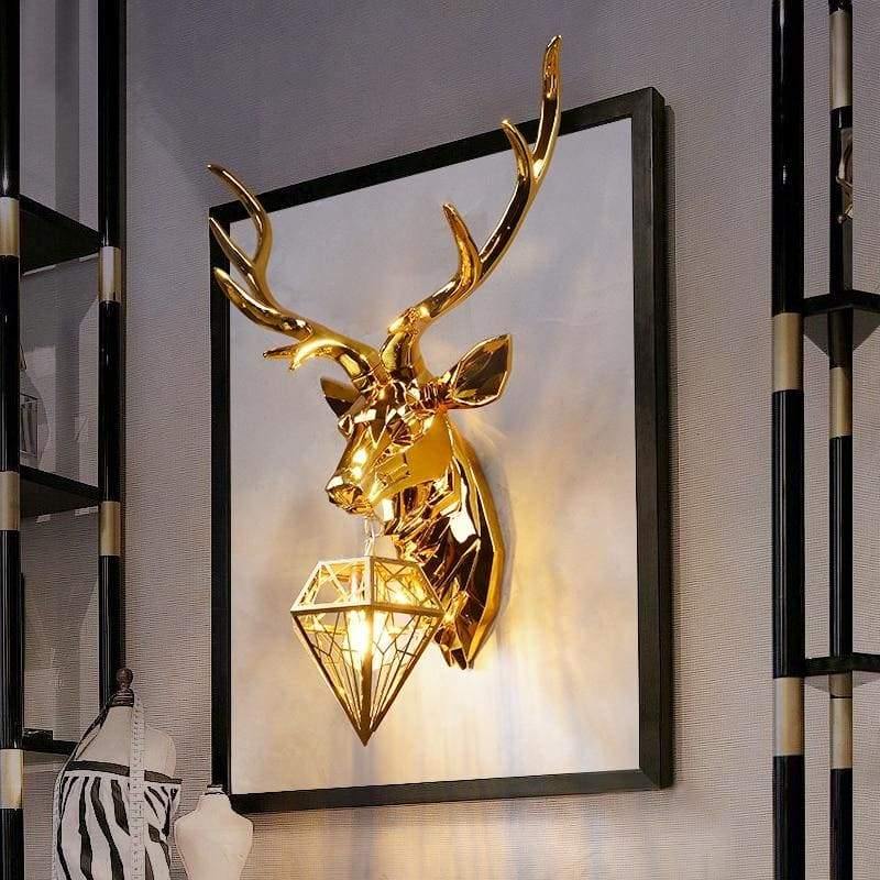 Applique murale tête de cerf dorée Pavillon