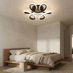 Plafonnier courbes lumineuses en acrylique noir Ruban – mise en situation (visuel d’ambiance)