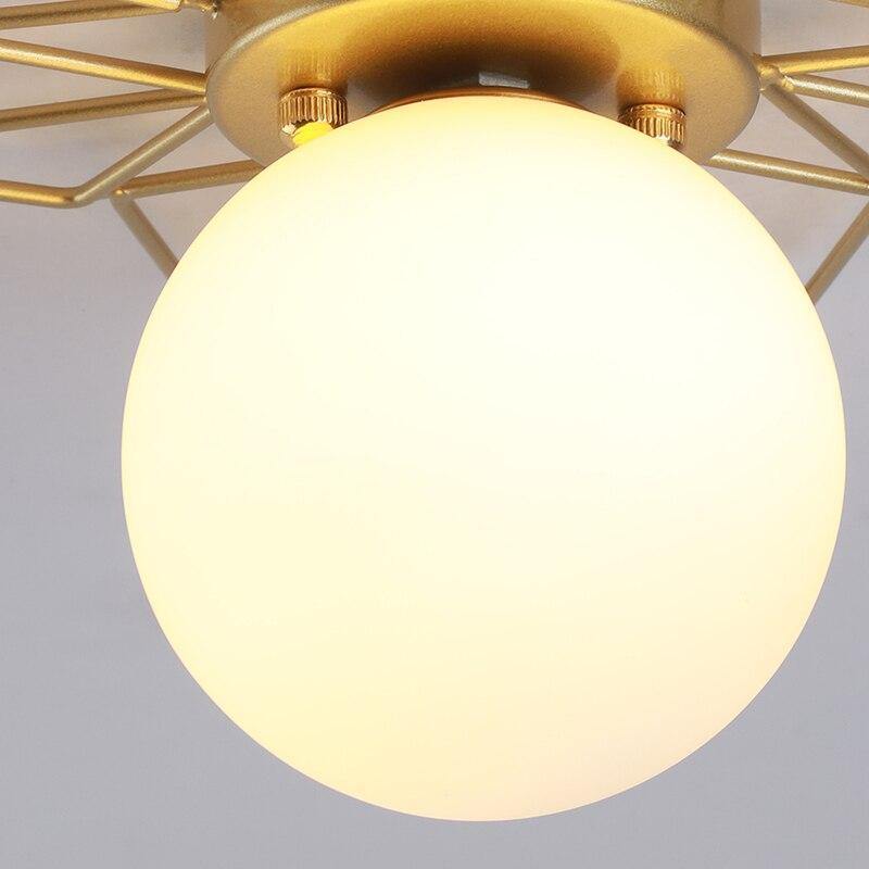 Plafonnier globe en verre et rayons dorés Soleil – vue 6
