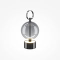 Lampe à poser sphère fumée et métal noir Ilona