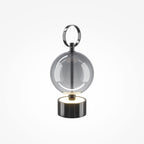 Lampe à poser sphère fumée et métal noir Ilona