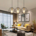 Suspension trois cadres hexagonaux noir et or Sizain, finition noir et or