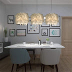 Suspension boule en plumes blanches Sylphe